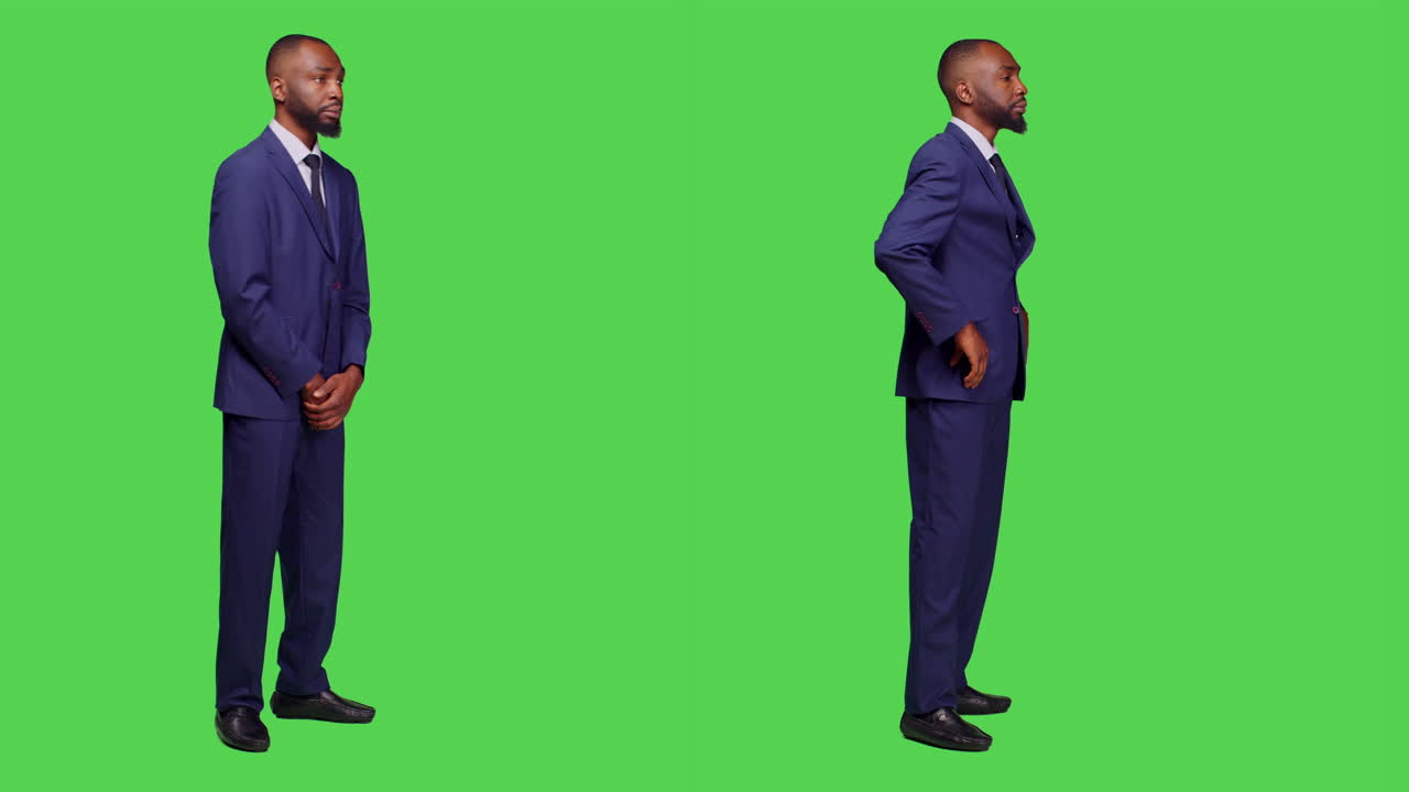 Homem de terno posando em tela verde