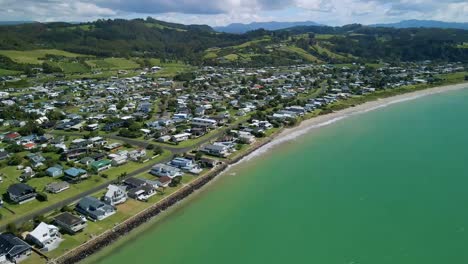 flying into coromandel new zealand at high tide