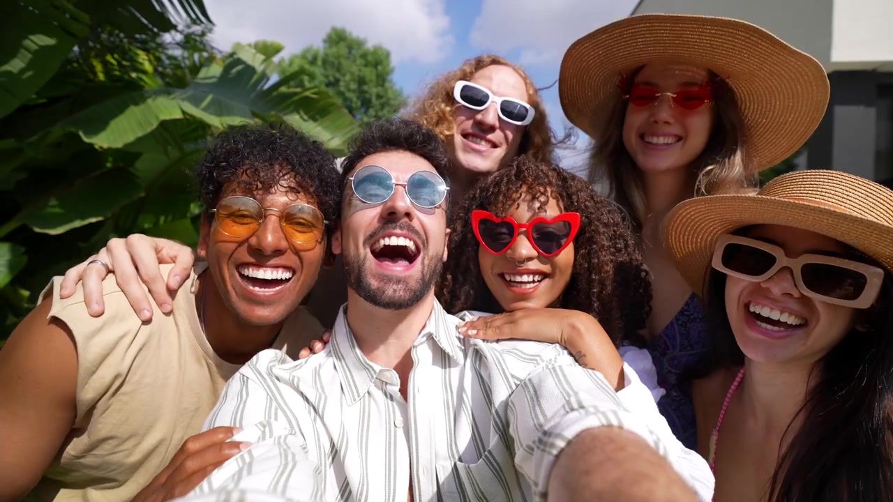 Happy Diverse Friends Taking a Group Selfie on a Sunny Summer Day
