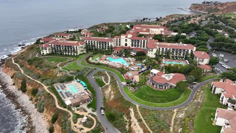 Epic-establishing-aerial-view-of-Terranea-Luxury-Resort-property-in-Palos-Verdes-over-the-Pacific-Ocean