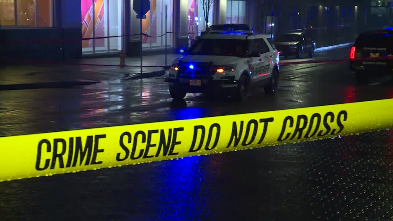 CRIME SCENE DO NO CROSS TAPE WITH COP CAR