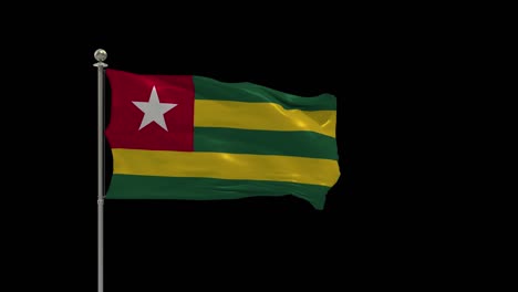 togo  various of flags waving national flag on pole, table flag