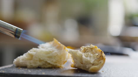 toasting ripped bread with blow torch