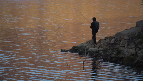 fisherman at the lake