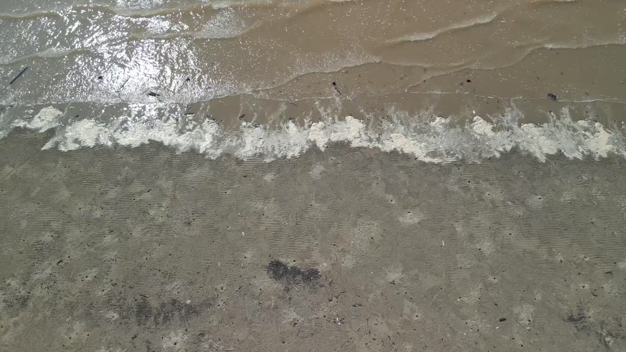 Aerial Drone View During Summer Alit Fishing Village,Kabong With, Facing Open Blue Sea, White Sandy Beach,Green Coconut, Palm Trees,And River,Sarawak,Borneo
