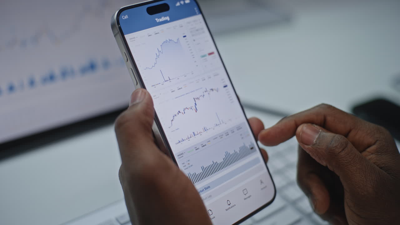Person Using a Mobile Trading App