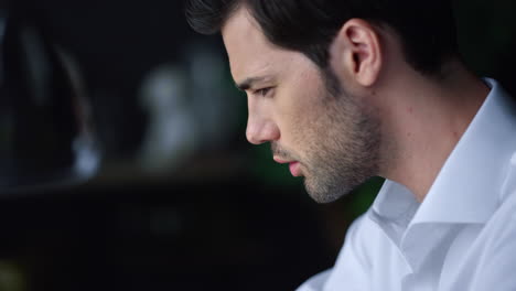 Serious-businessman-portrait.-Focused-male-employee-working-indoors