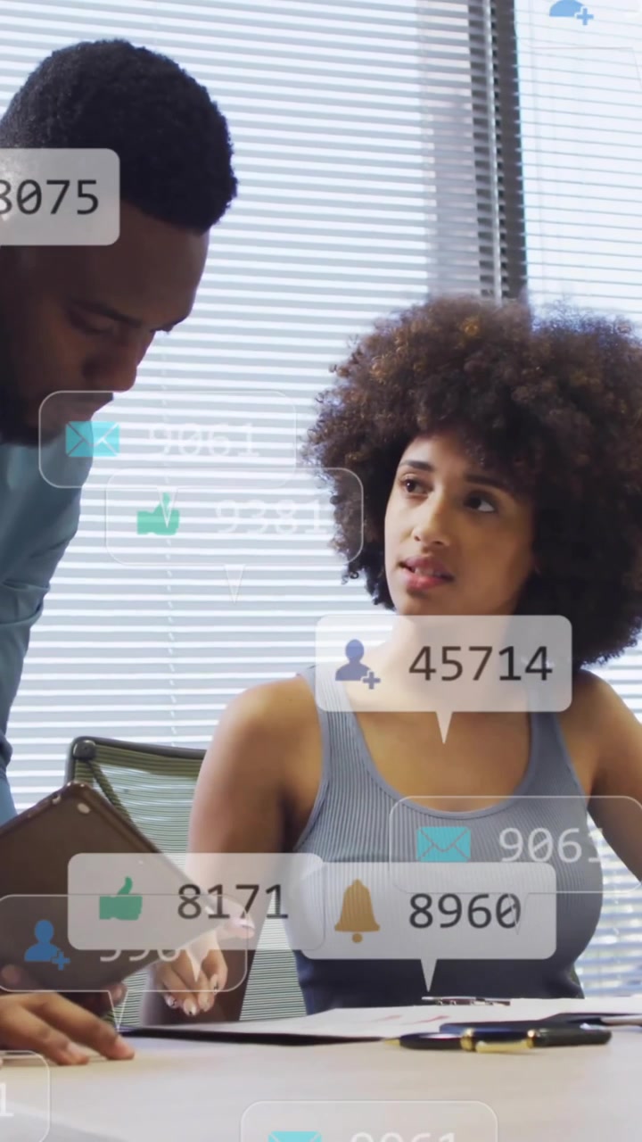 Discussing social media analytics, colleagues in office with engagement animation icons