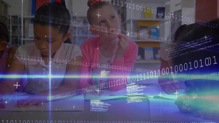 Binary code overlay appearing over library table inspiring three elementary students writing notes
