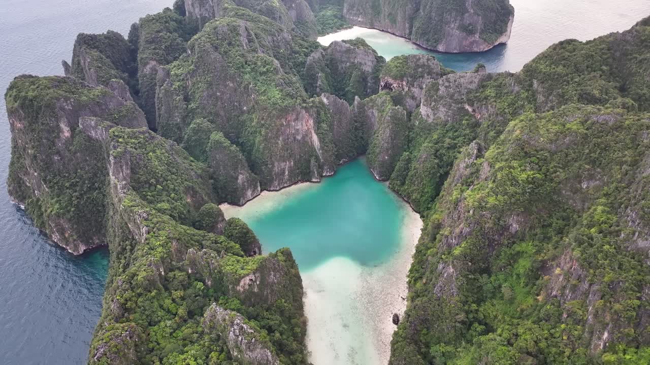 Dramatic aerial cover in cloud, Pi Leh Bay and Maya Bay. Phi Phi Islands, travel destination Thailand.