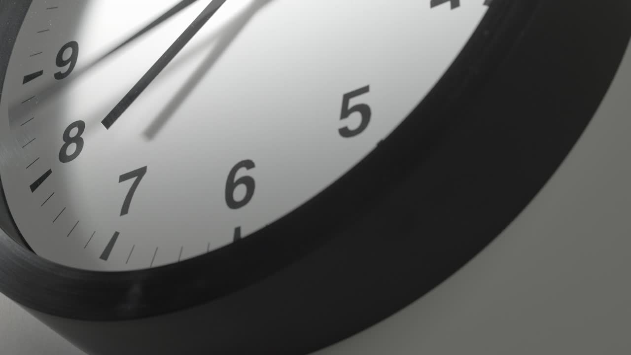Clock Face in Time Lapse on White Wall in Office