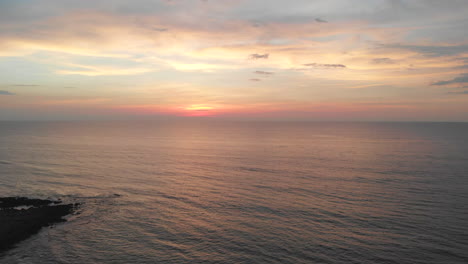 calm sea under the magnificent sunset sky in la union, philippines - travel destinations - aerial