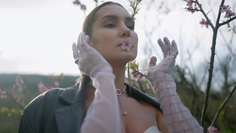 woman with flower in spring garden