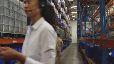 young female manager in a warehouse