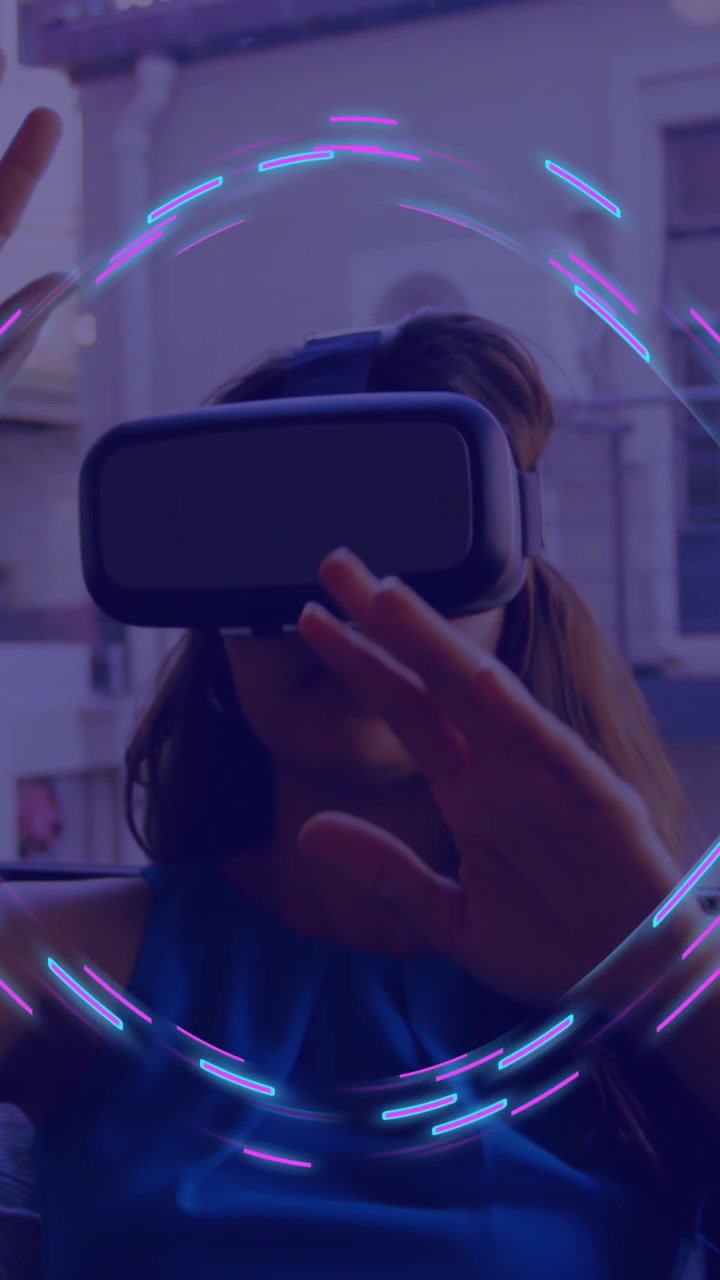 Animation of glowing light trails of data transfer over woman in vr headset
