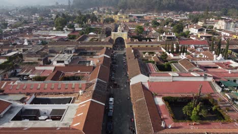 Low-aerial-approaches-famous-Santa-Catalina-Arch-in-Antigua-Guatemala