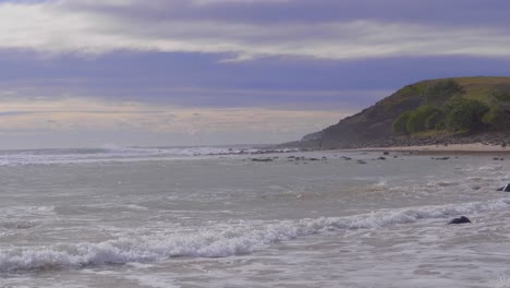 Surfers-With-Yellow-Surfboard-Walking-At-The-Beach-In-Crescent-Head---Surfers-Paradise-In-New-South-Wales,-Australia---medium-full-shot