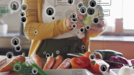 Preparing vegetables in kitchen with social media notifications animation over scene