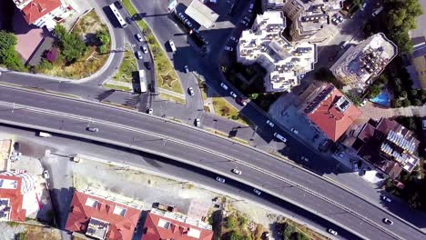 aerial view of urban cityscape with highway and buildings