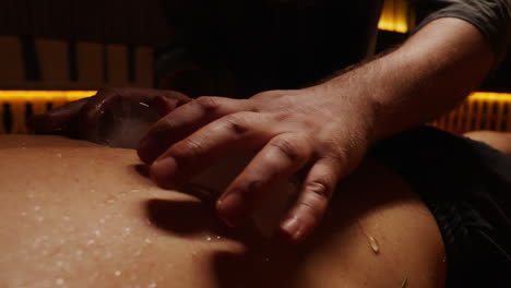 ice therapy back massage in sauna