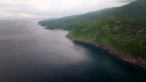 Foggy-Coast-And-Bay-At-Sunrise-In-Amed,-North-Bali,-Indonesia