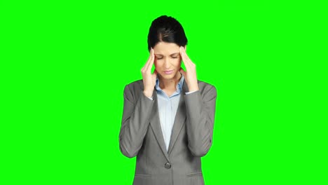 Businesswoman-suffering-of-a-headache