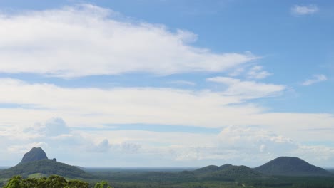 clouds moving over tranquil mountain scenery