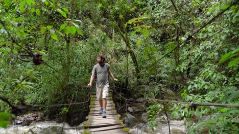 man traveler walking on footpath above river