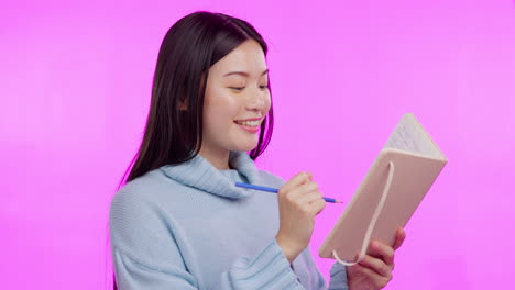 asian woman, writing and idea with diary in studio