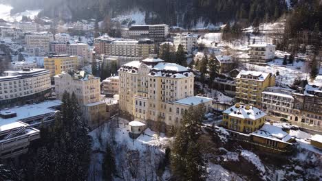 Drone-Shot-of-old-Buildings-in-a-City-in-the-Mountains-in-Winter