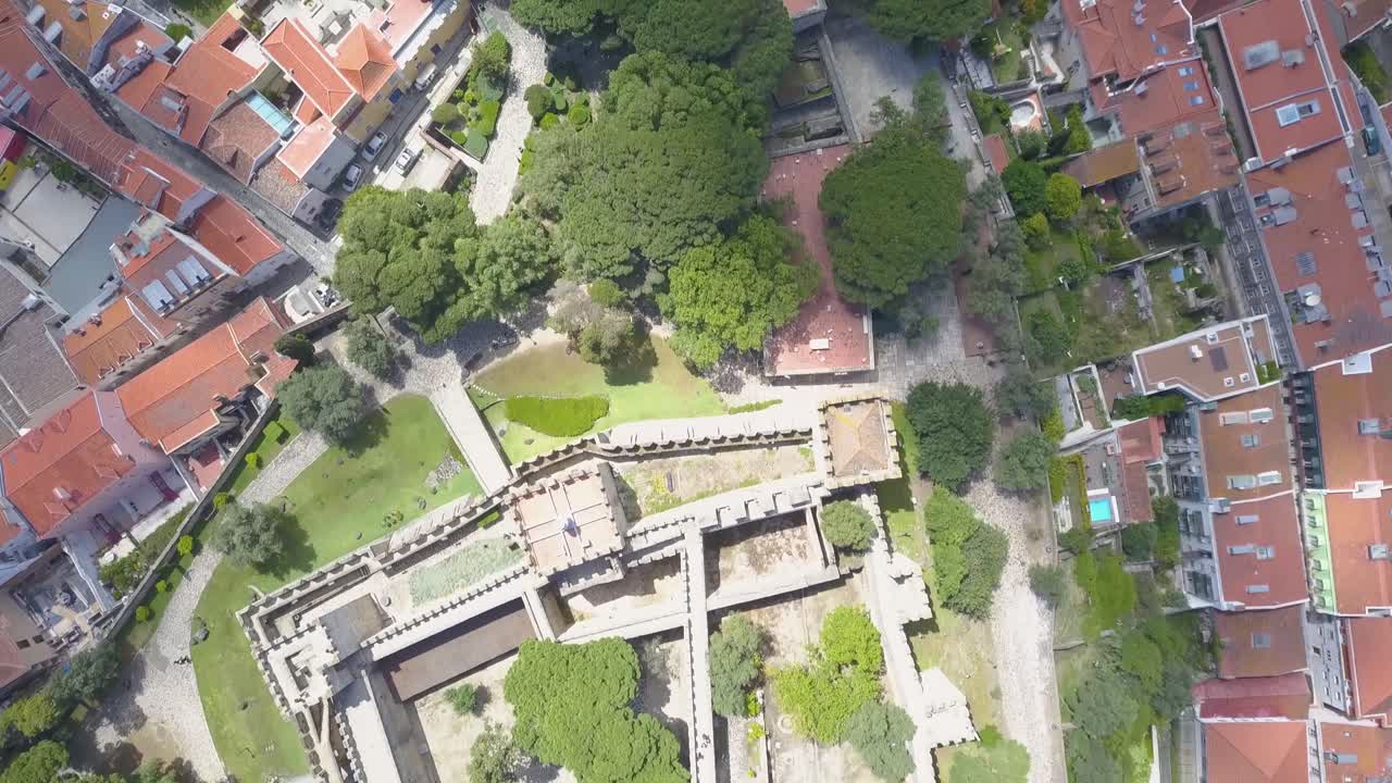 Sao Jorge Lisbon castle walls top down trucking pan bird's eye view