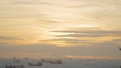 sunset over a busy shipping lane