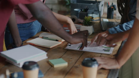 diverse team discussing business report