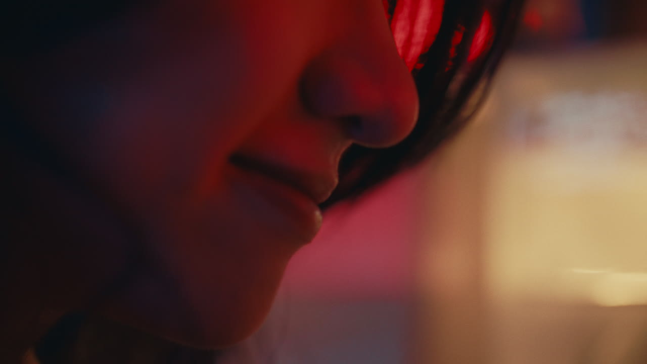 Woman's Profile in Neon Light