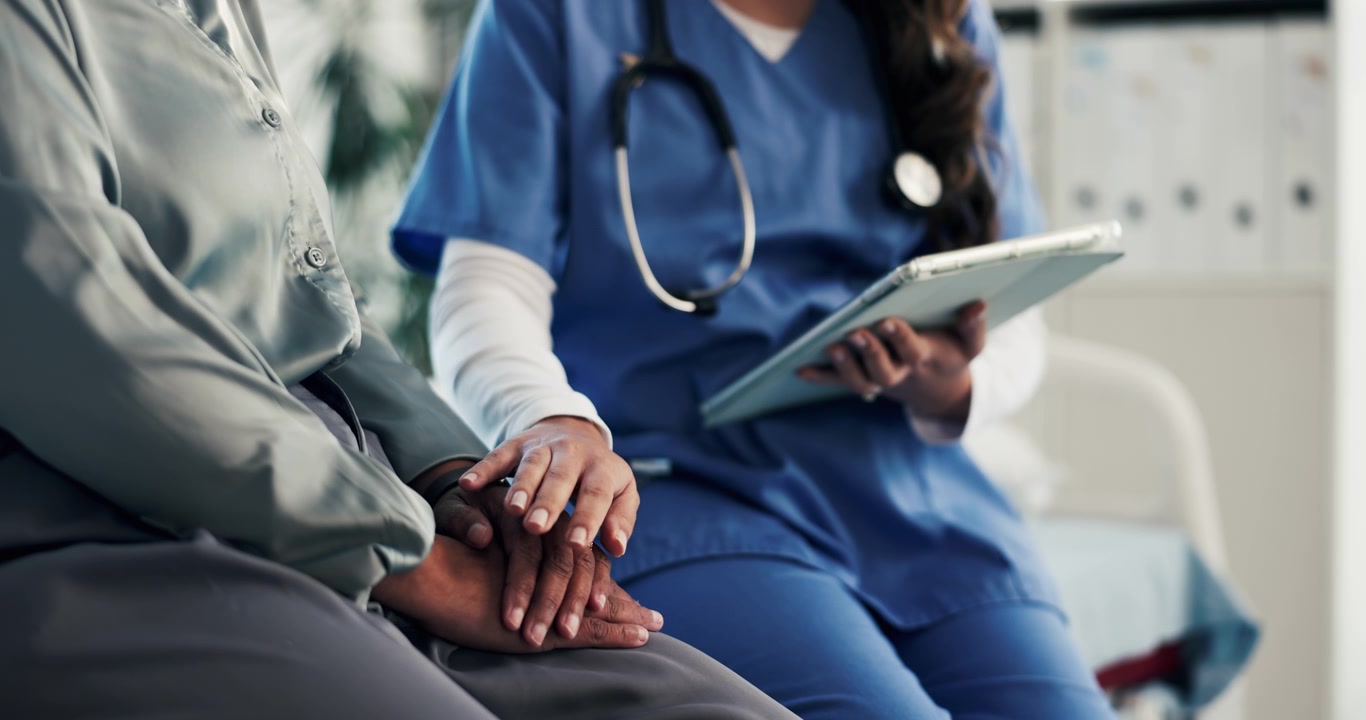 Doctor Comforting Patient During Medical Consultation