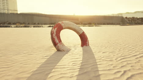 Lifebuoy-on-the-city-beach-at-sunset