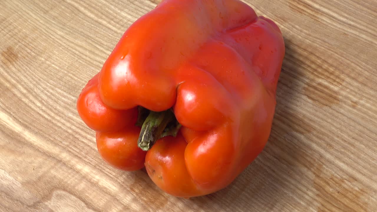 Søt rød paprika. Fotografering i bevegelse