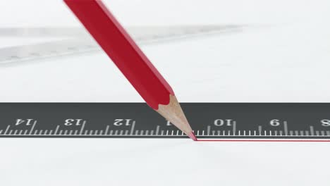 el lápiz rojo dibuja una línea a lo largo de la regla