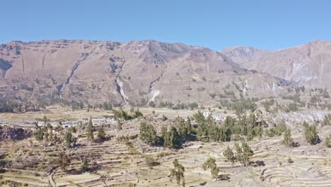 Maca-district-aerial-shot,-Peña-Blanca-tunnel,-Colca-Valley-route