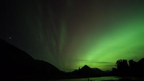 spectacular starscape time lapse with northern lights, aurora borealis  display viewed near mount bonner kimberly british columbia canada.