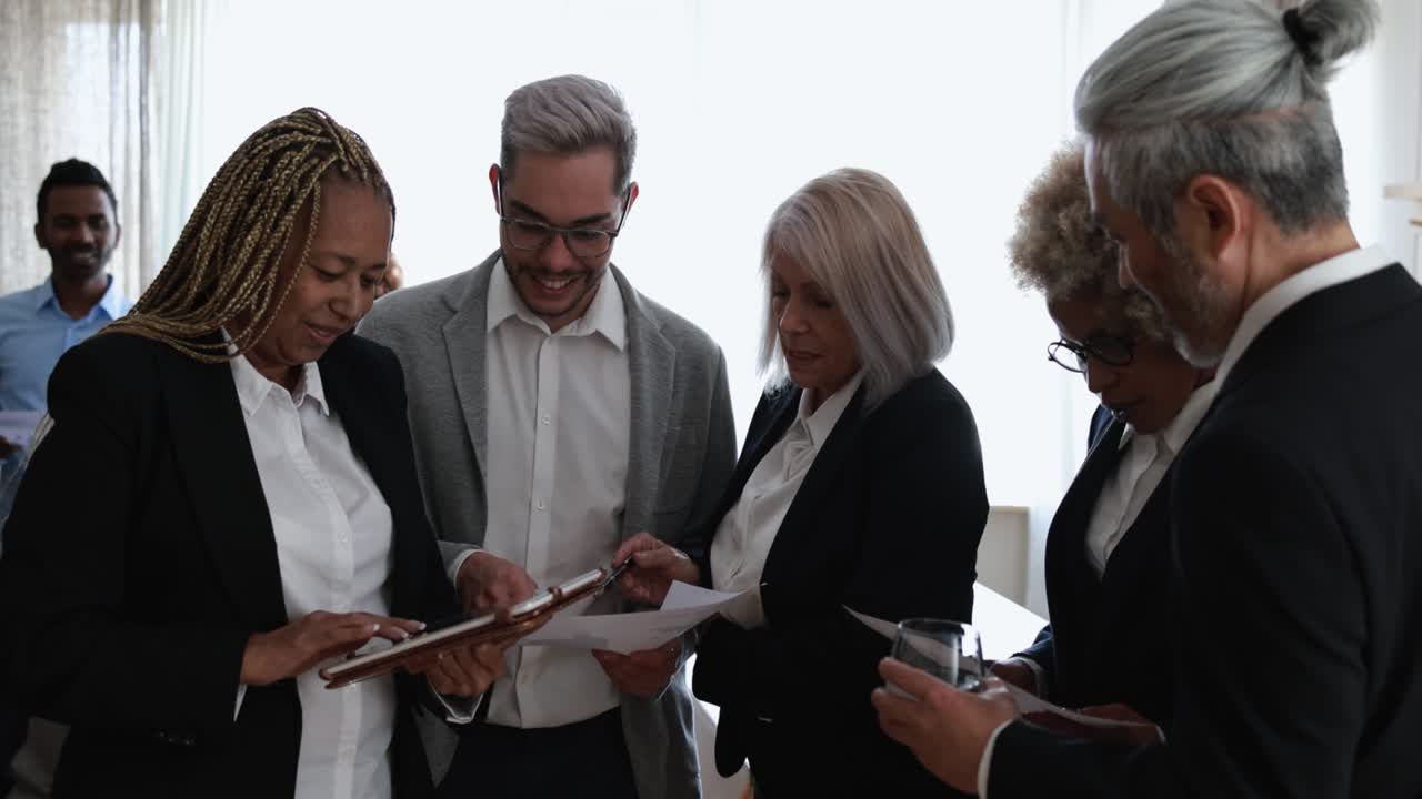 Multiracial business people working inside bank office - Meeting and startup concept