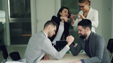 office fun: arm wrestling and photos