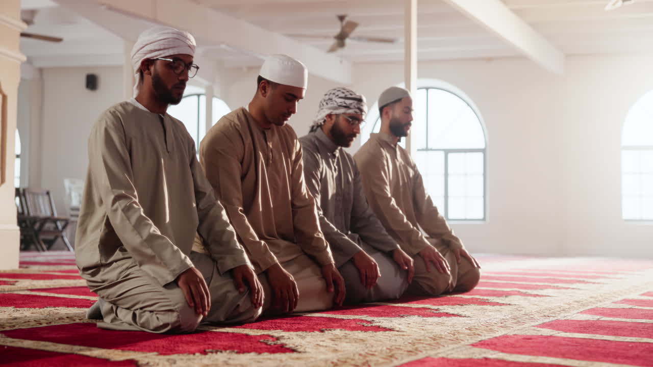 Muslim men praying in a mosque