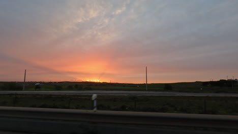 view of the sunset from the car window