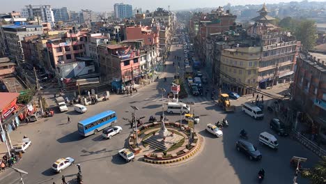 kathmandu, nepal: an aerial view of traffic on a roundabout in the city of kathmandu, nepal