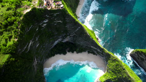 slow motion, white and turquoise waves, lush vegetation, dramatic scenery