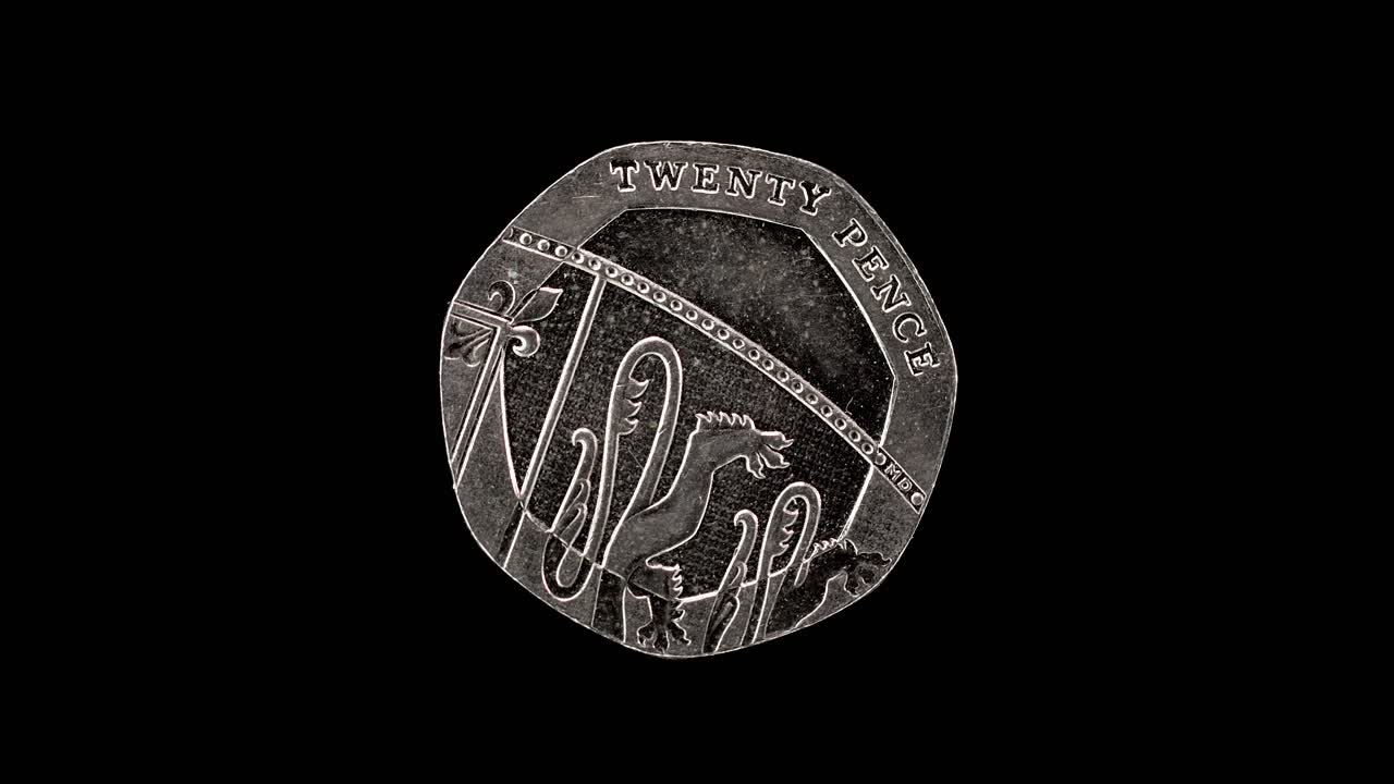 United Kingdom 20 pence 2013 reverse with Royal Shield segment, macro loop on black background