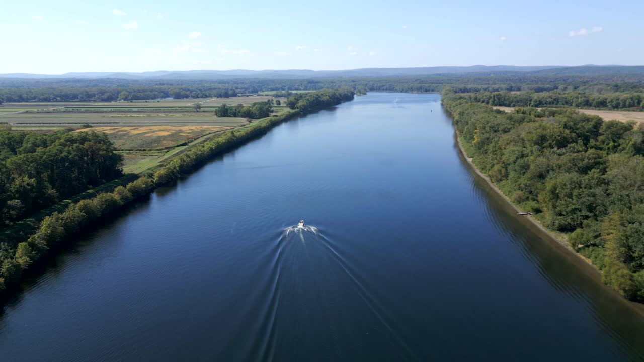 Motorboat Across The Water Of The Connecticut River In Hadley, Massachusetts, United States. Aerial Shot
