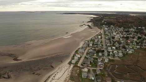 stunning aerial shot of a small beach town in maine