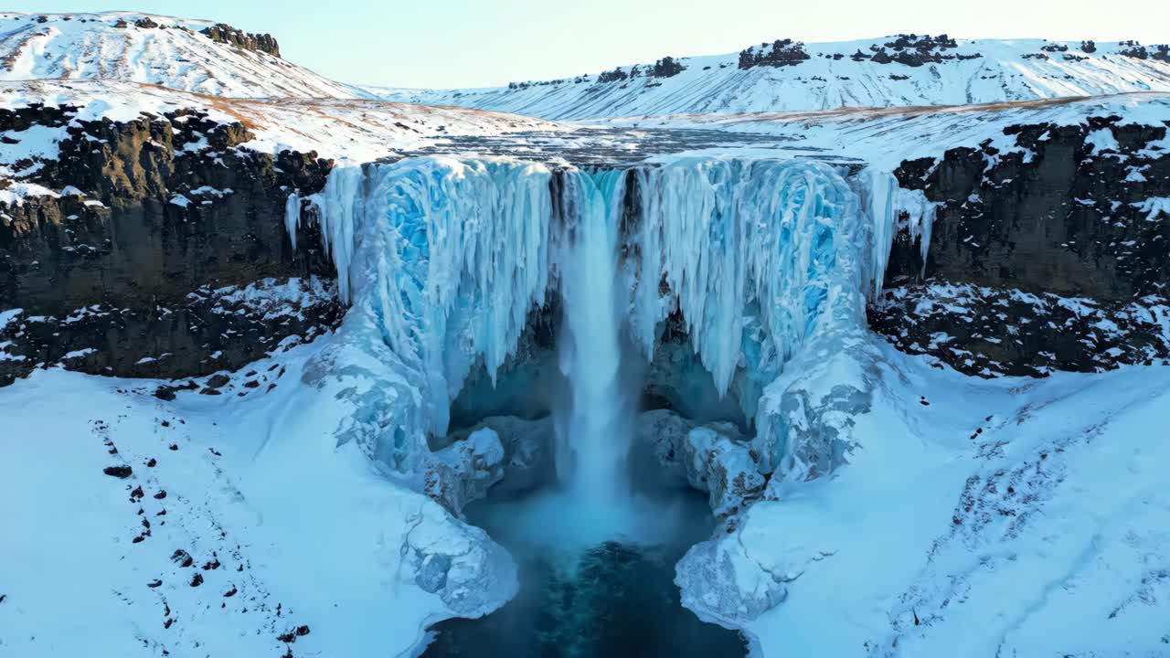 Frozen Waterfall in Winter Landscape